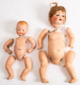 An early 20th Century Heubach & Koppelsdorf bisque head doll.