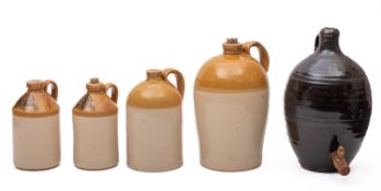 Five 20th Century stoneware flagons.