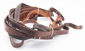 Ten 20th Century rifle slings. Various designs, longest 86cm.