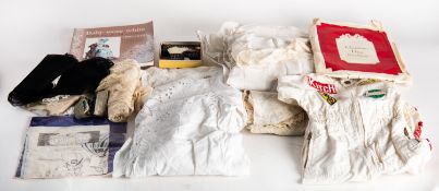 A collection of Victorian and later lace, including bonnets, collars,