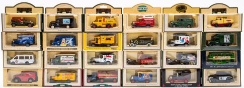A collection of Lledo Days Gone and Vanguard diecast vehicles.