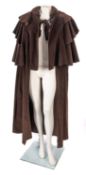 A 1970's 'Traver Tempo, London', brown corduroy ruffle cloak, size 16,
