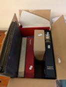 An accumulation of stamps in albums and loose contained in four boxes with thematic collection of