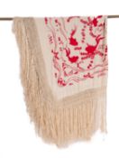 A Victorian embroidered silk shawl.