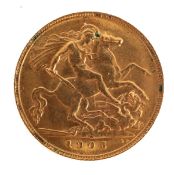 A 1905 Edward VII half sovereign in a leather purse