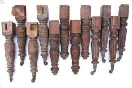A set of four knop turned and reeded table legs.