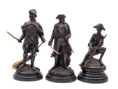 Two cast bronze figures of soldiers signed Boucher, shown in standing positions with swords in hand,