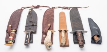 Three antler handled hunting knives.