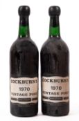 Two bottles of Cockburns 1970 vintage port. No qty or vols shown.