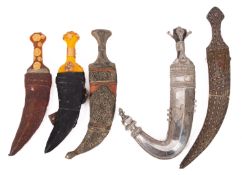 Five 20th Century Arabic daggers.