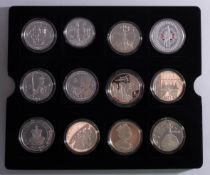 The Golden Jubilee £5 silver coins. With others, cased.
