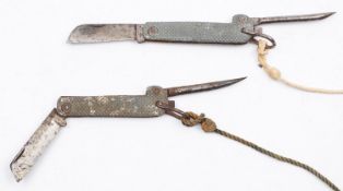 Two British WWII pocket knives. Both having hinged blades and moulded grips.