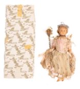 A 19th Century wax head doll,