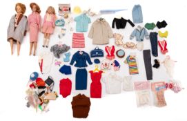 Three Mattell Barbie dolls.