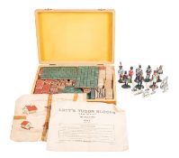 An early 20th Century Lotts Tudor stone building block set in original box.
