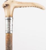 A Swaine & Adney riding crop,