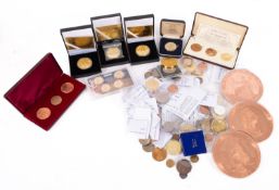 A large collection of reproduction and other fantasy coins etc.