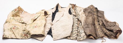 An early 19th Century cream silk waistcoat with floral embroidery to pockets and edges.