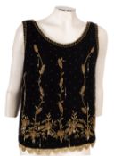 A group of four vintage style vest tops,