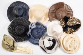 A group of various lady's hats, including sun hats, dress hats, etc.
