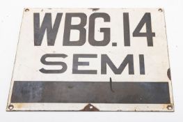 A collection of 20th century railway signs together with a signal flag.