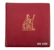 A coin album containing an 1816 shilling, 1902/13 1/3rd farthings,