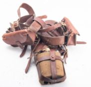 A 1914 pattern brown leather webbing belt and harness,