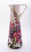 A Moorcroft pottery limited edition ewer of tapering form tube lined in the Wild Gladioli pattern