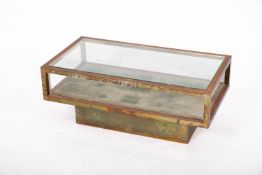 A metal framed, glass topped and perspex sided low display table, circa 1970s; of rectangular form,