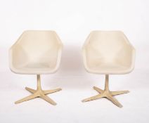 Robin Day for Hille, a pair of white poly tub chairs, originally designed in 1947,