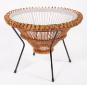 Franco Albini (Italian, 1905 - 1977); a glass topped, rattan and metal circular occasional table,