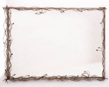 A metal framed rectangular wall mirror,