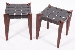 Edmond Spence (American, 1911-1986), a pair of teak and leather strapworked stools,