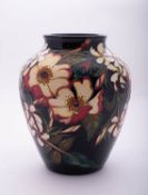 A Moorcroft pottery limited edition vase of oviform and tube lined in the Lakme pattern after a
