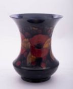 A William Moorcroft pottery vase of waisted form,