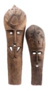 Two large Oceanic carved palmwood masks,