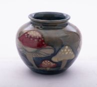 A William Moorcroft pottery vase,