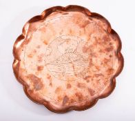 HERBERT DYER (1898-1974); an Arts & Crafts circular copper tray,