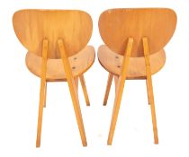 A pair of beech and beech veneered plywood side chairs designed by Junzo Sakakura, model no.