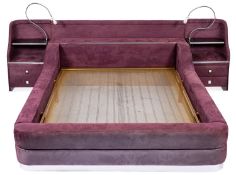 A purple faux suede covered board double bed,