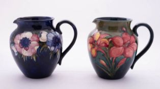 Two Walter Moorcroft pottery jugs,