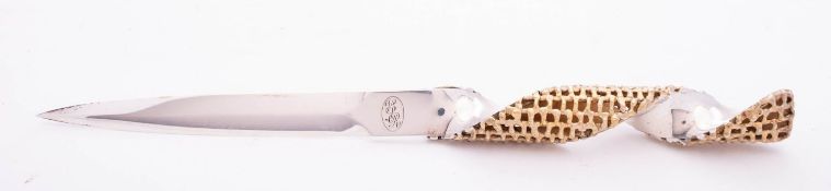 A cased Elizabeth II parcel gilt silver paper knife by Stuart Devlin, London 1976,