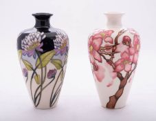 Two Moorcroft pottery vases of shouldered oviform comprising an example tube lined in the Confetti