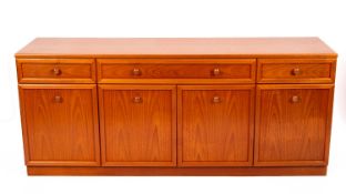 A G Plan teak veneered sideboard, circa 1970s; with one long drawer flanked by short drawers,