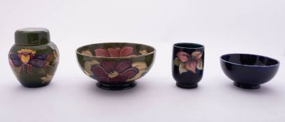 Four pieces of Moorcroft pottery,