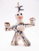 *Sandy Brown [born 1946] a stoneware figural candelabra,