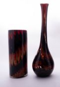 Attributed to Fratelli Toso Murano a glass cylinder vase with combed bands of purple,