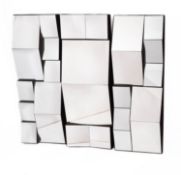 A set of three contemporary wall mirrors, each of rectangular form,