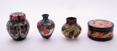 Four pieces of Moorcroft pottery,