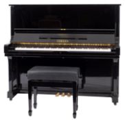 A Yamaha U3 black lacquered upright piano, modern; serial number A3857548, 130cm high,